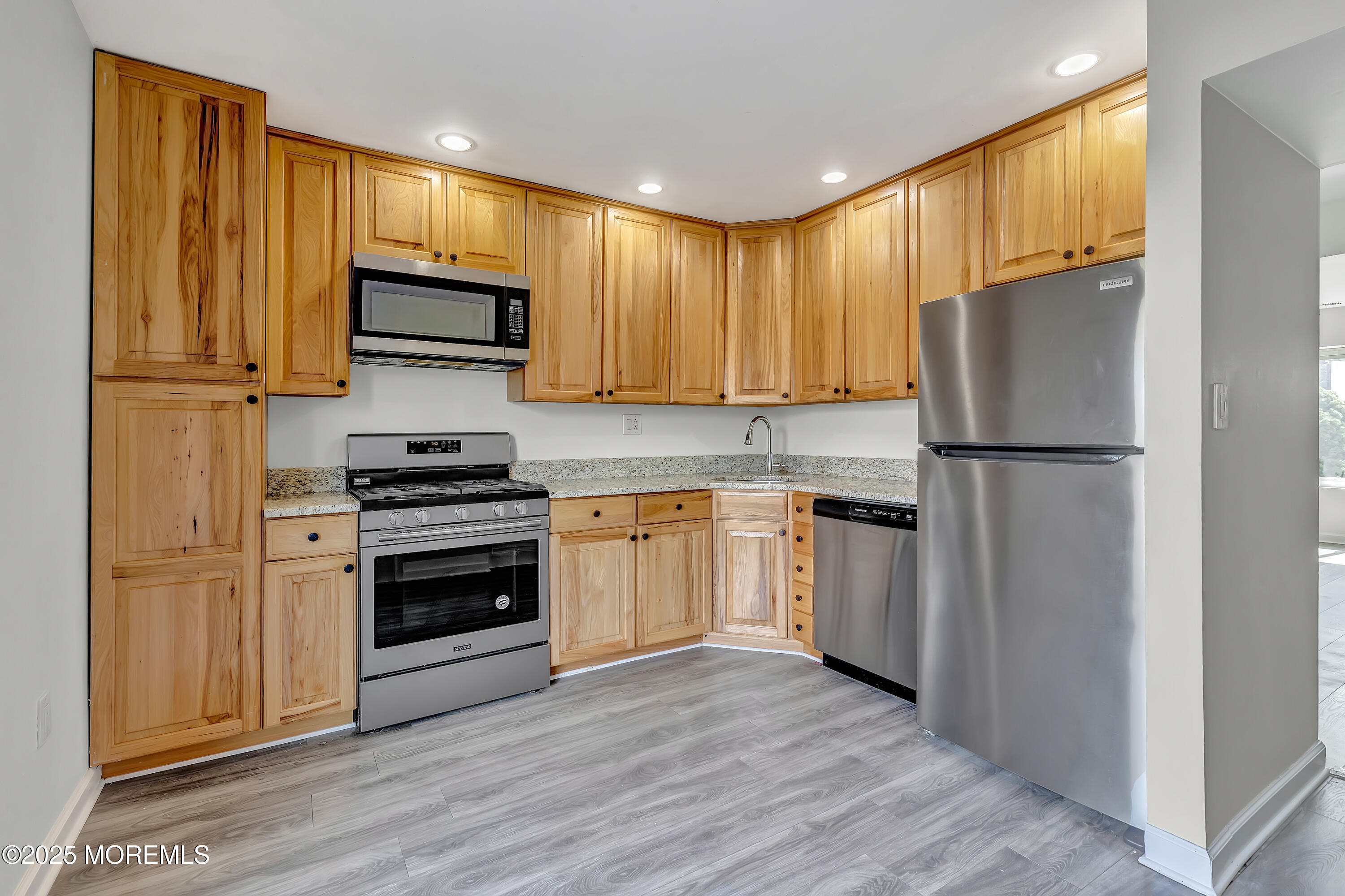 7 Creek Road Brick, NJ 08724 - Photo 13 of 26 a kitchen with a refrigerator sink and microwave