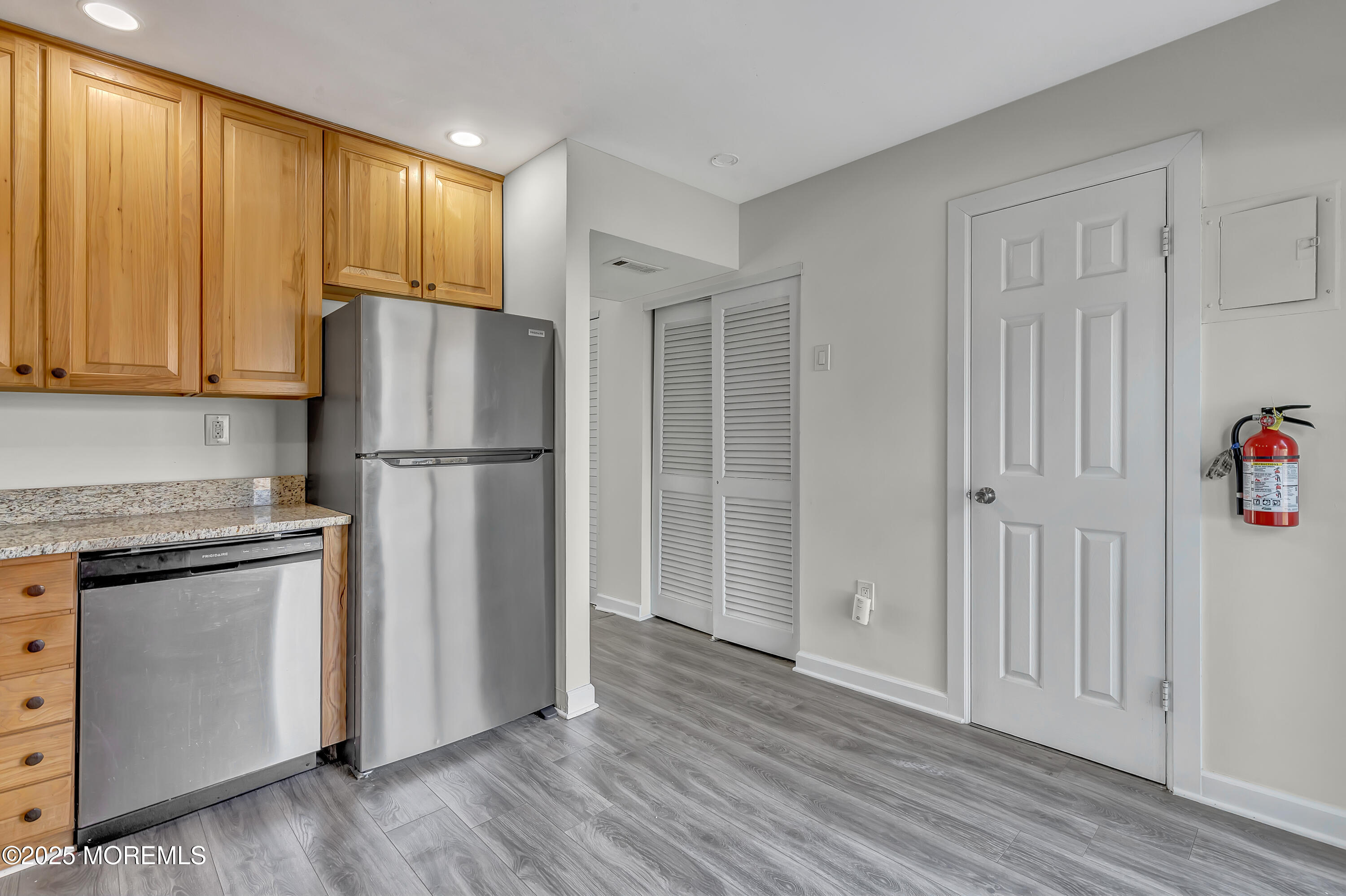7 Creek Road Brick, NJ 08724 - Photo 14 of 26 a kitchen with a refrigerator and cabinets