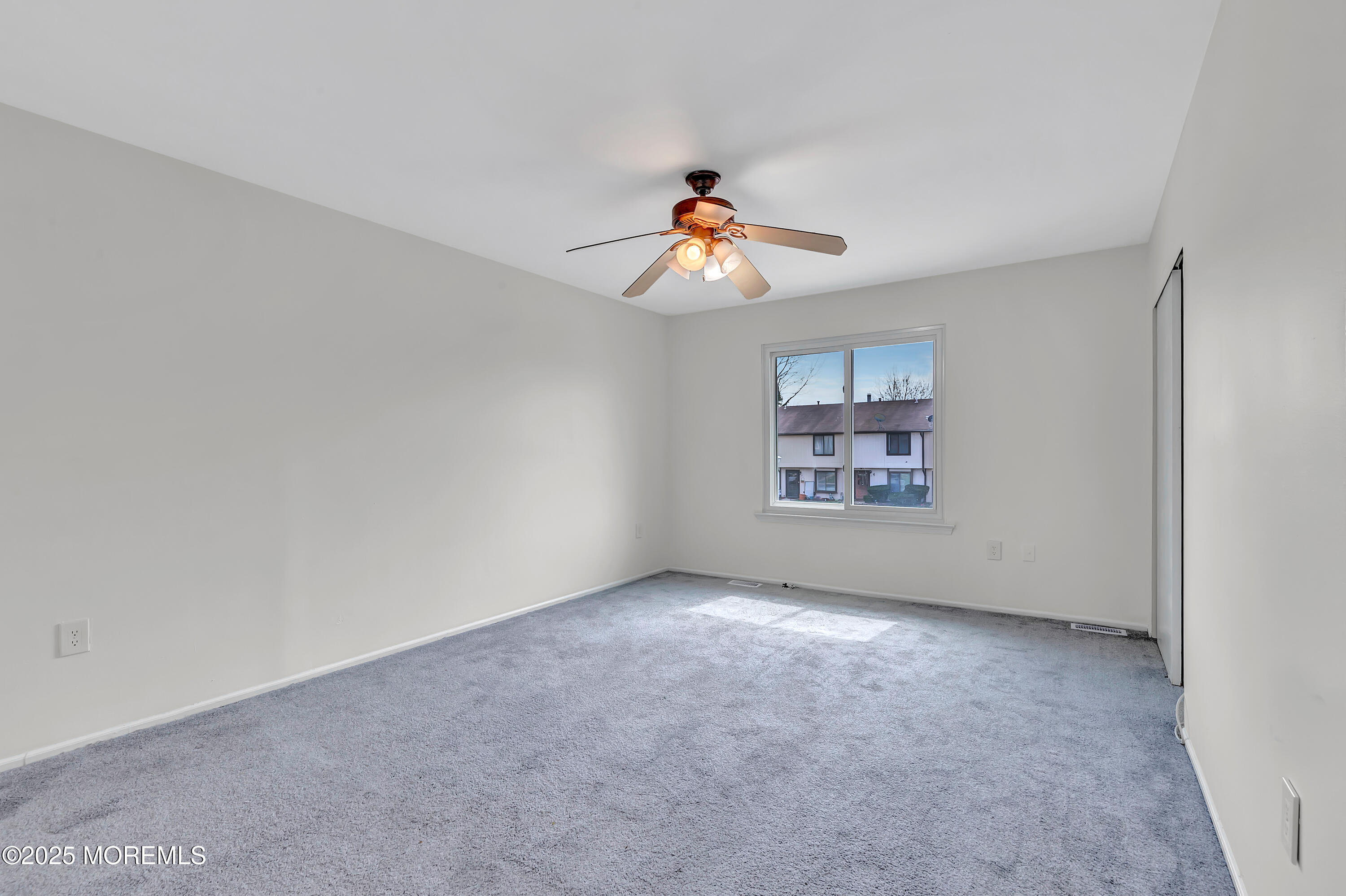 7 Creek Road Brick, NJ 08724 - Photo 19 of 26 a view of an empty room with a window