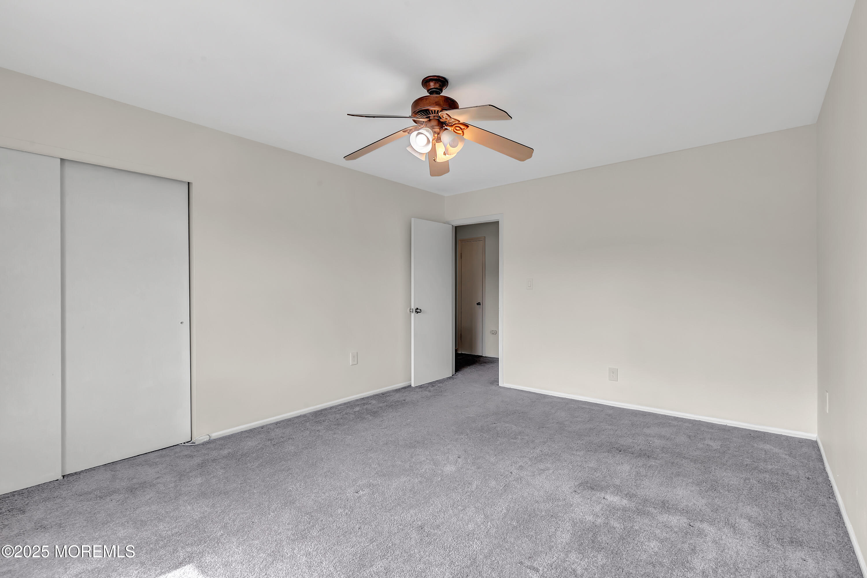 7 Creek Road Brick, NJ 08724 - Photo 20 of 26 a view of an empty room with a window