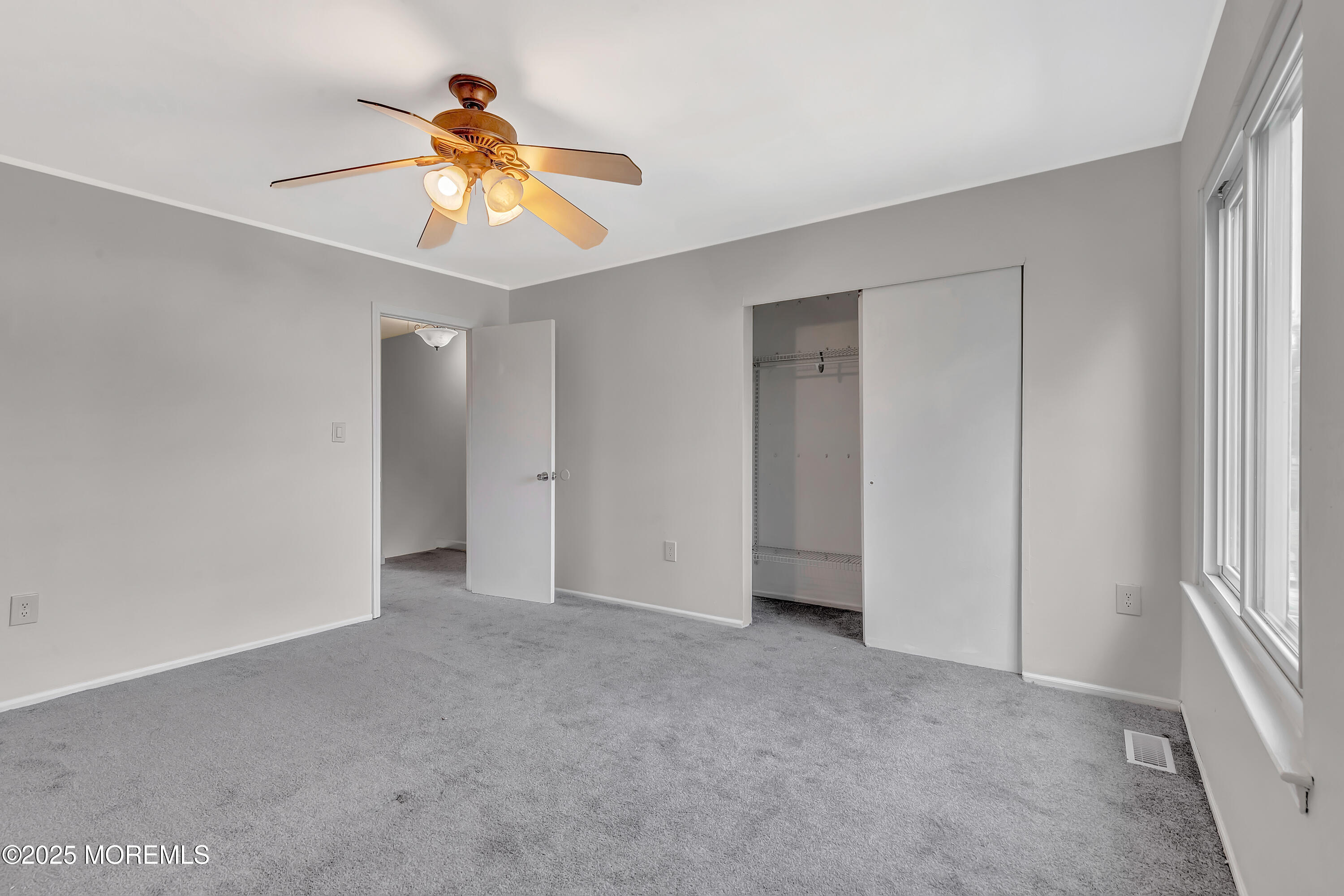 7 Creek Road Brick, NJ 08724 - Photo 22 of 26 a view of an empty room with a window