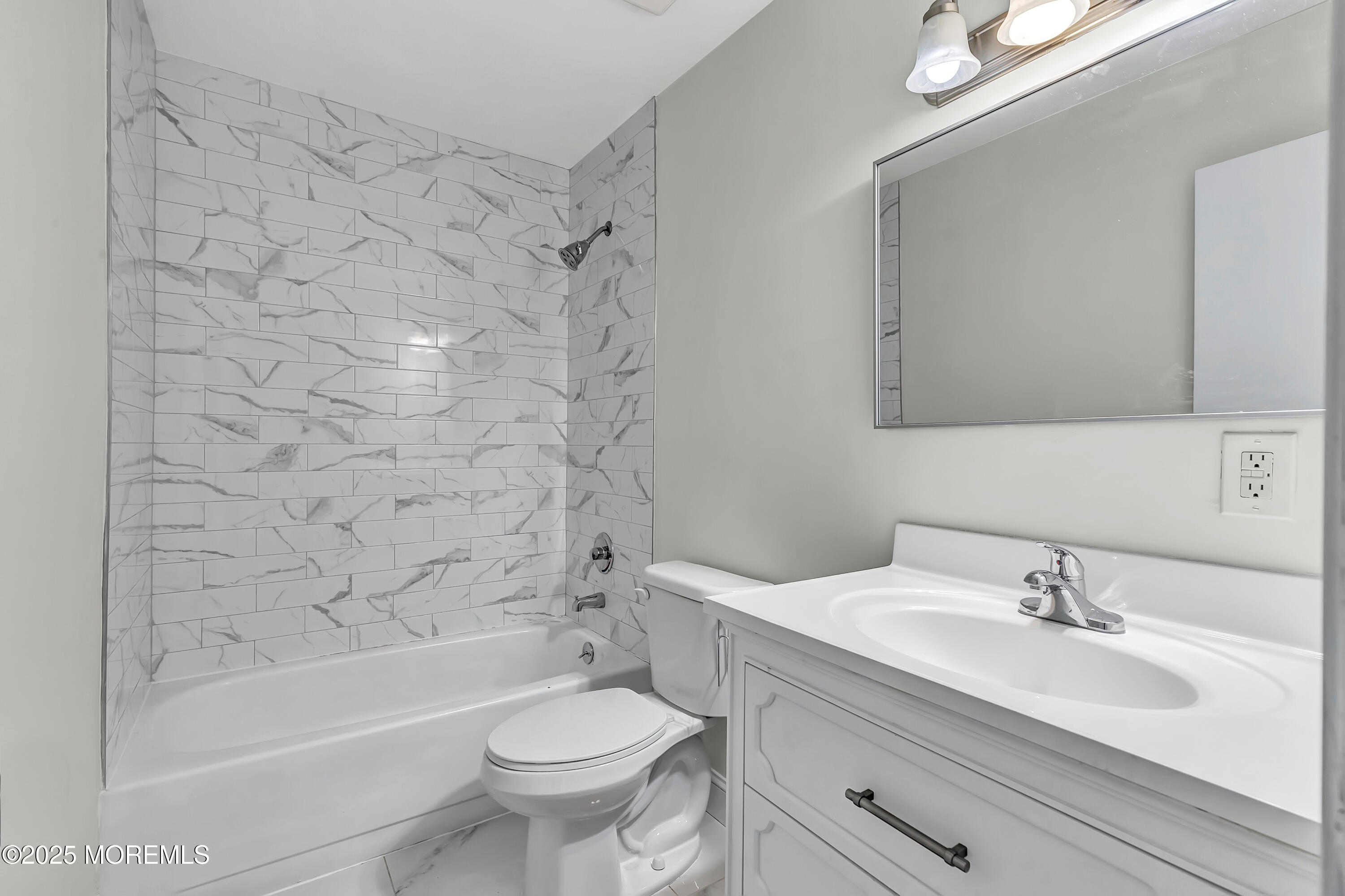 7 Creek Road Brick, NJ 08724 - Photo 23 of 26 a bathroom with a sink toilet and shower