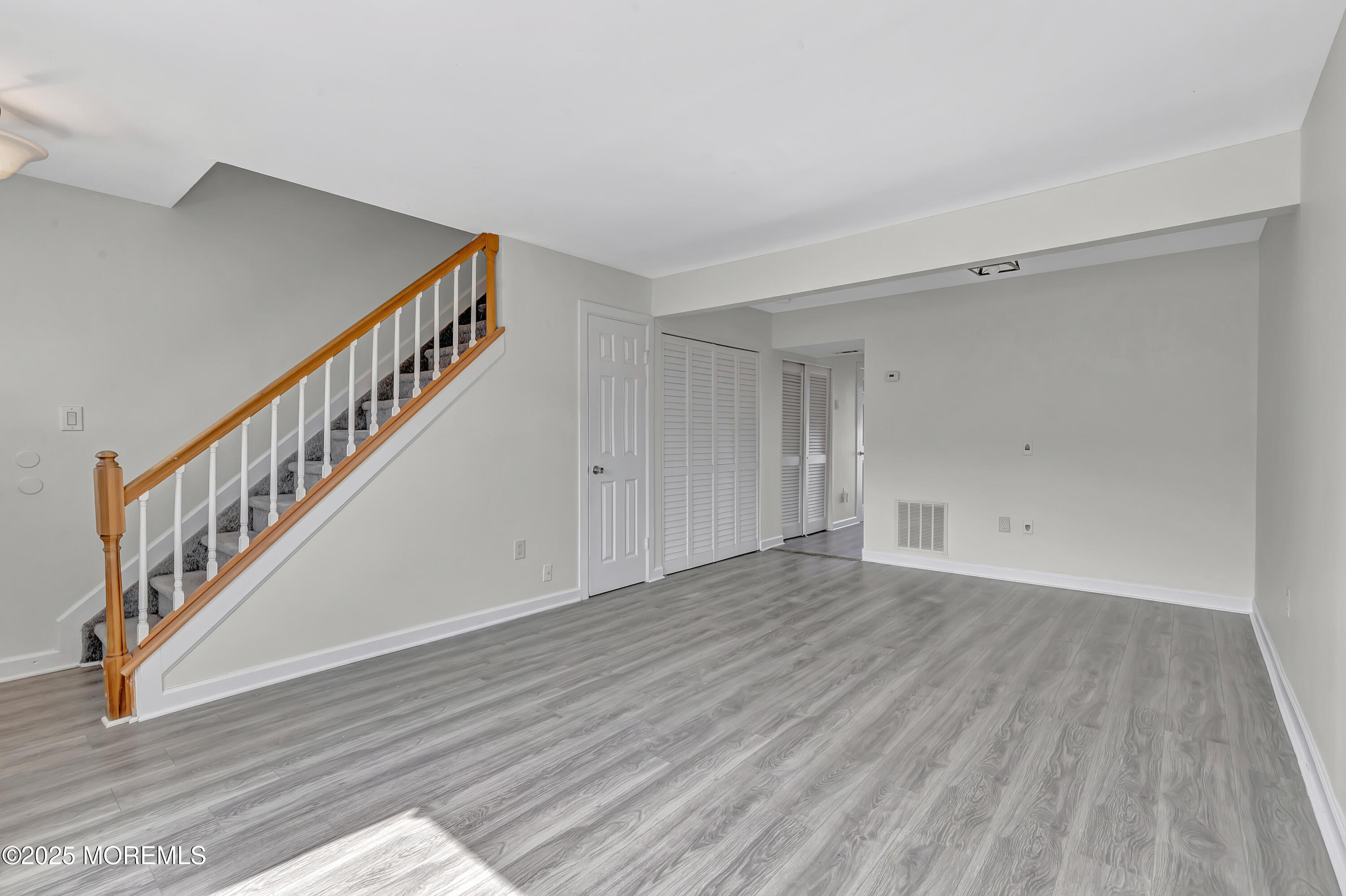 7 Creek Road Brick, NJ 08724 - Photo 7 of 26 a view of an entryway with wooden floor