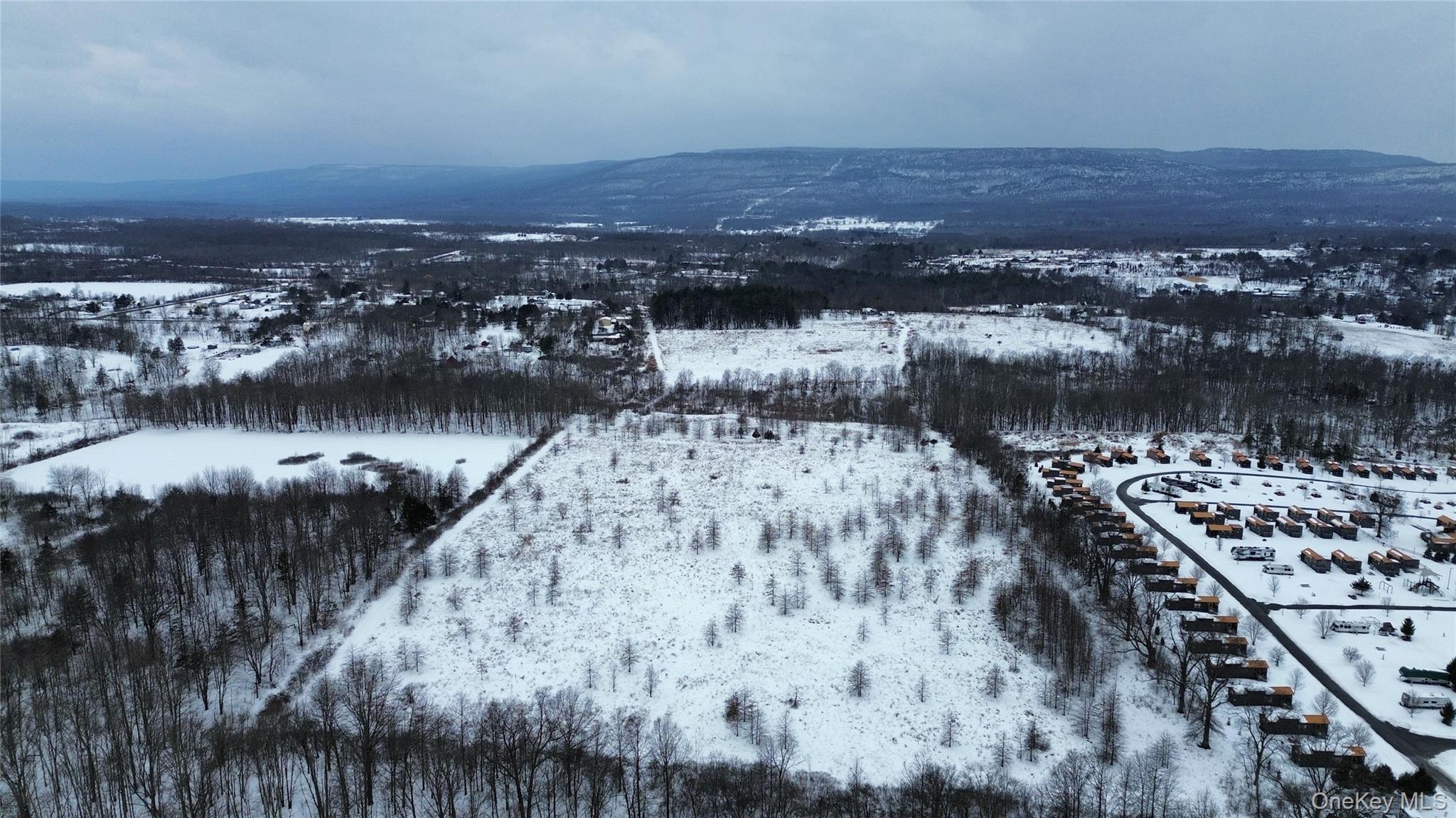 Lot 11 Albany Post Road Gardiner, NY 12525 - Photo 8 of 11 a view of a lake with a city
