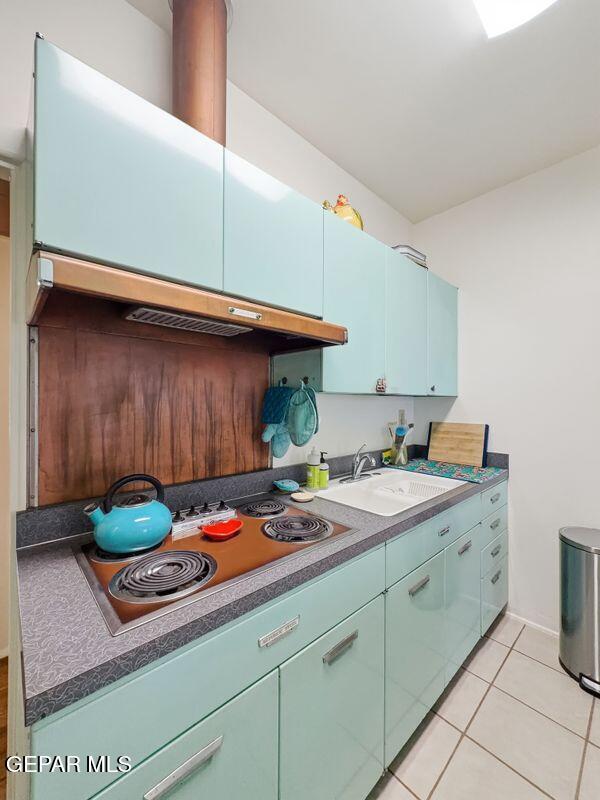 4135 Emory Road El Paso, TX 79922 - Photo 67 of 73 a kitchen with stainless steel appliances granite countertop a sink a stove and a microwave