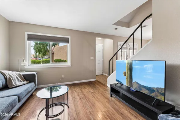 a living room with furniture and a window