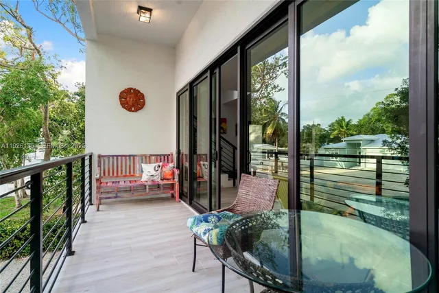 a balcony view with a outdoor space