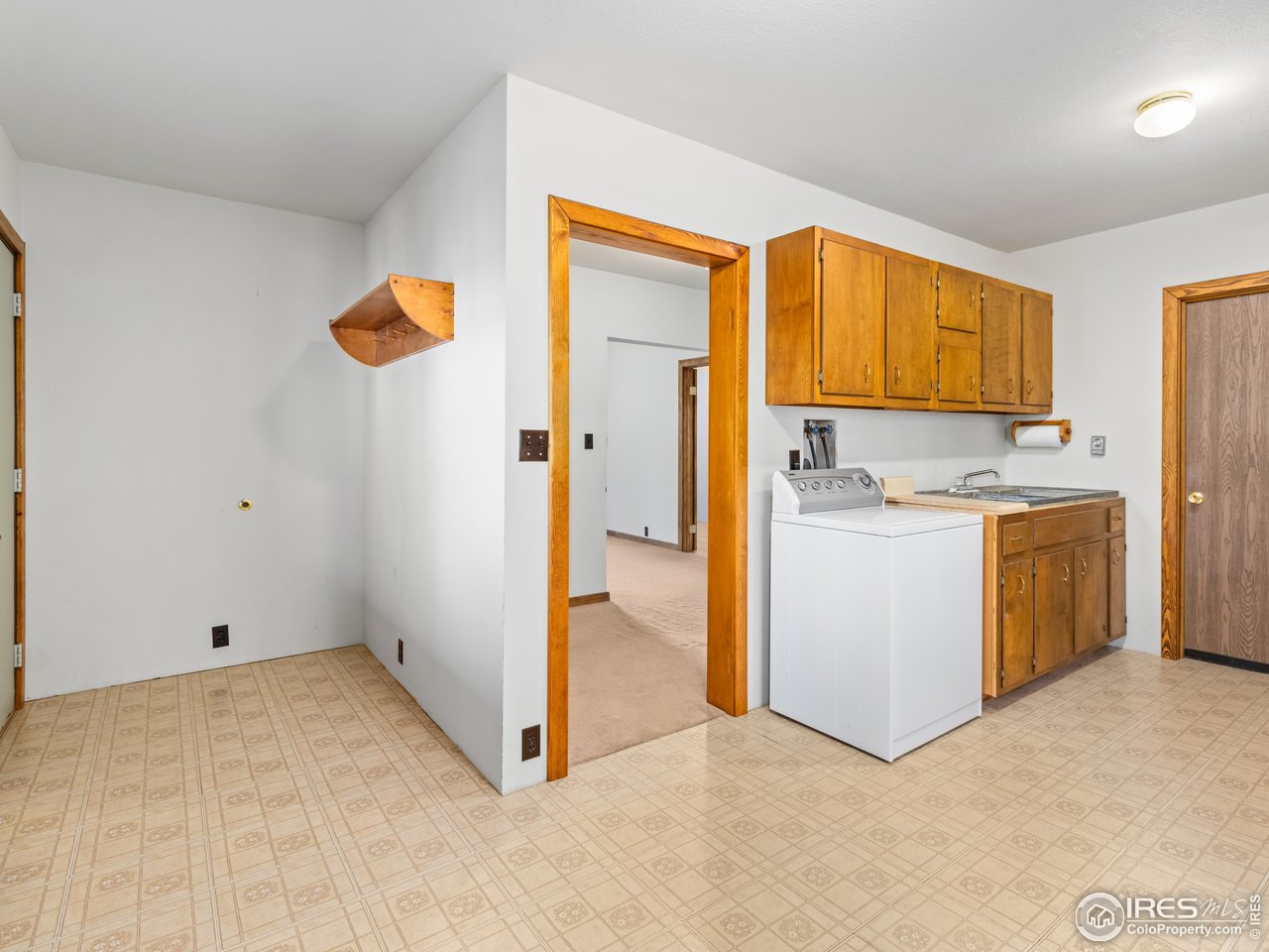 255 Apache Road Lyons, CO 80540 - Photo 25 of 33 Laundry room and lower level entry