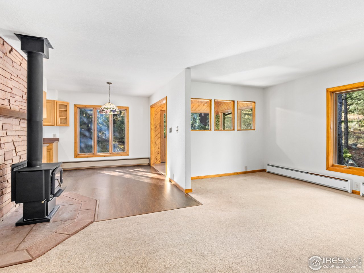 255 Apache Road Lyons, CO 80540 - Photo 10 of 33 Dining and living areas