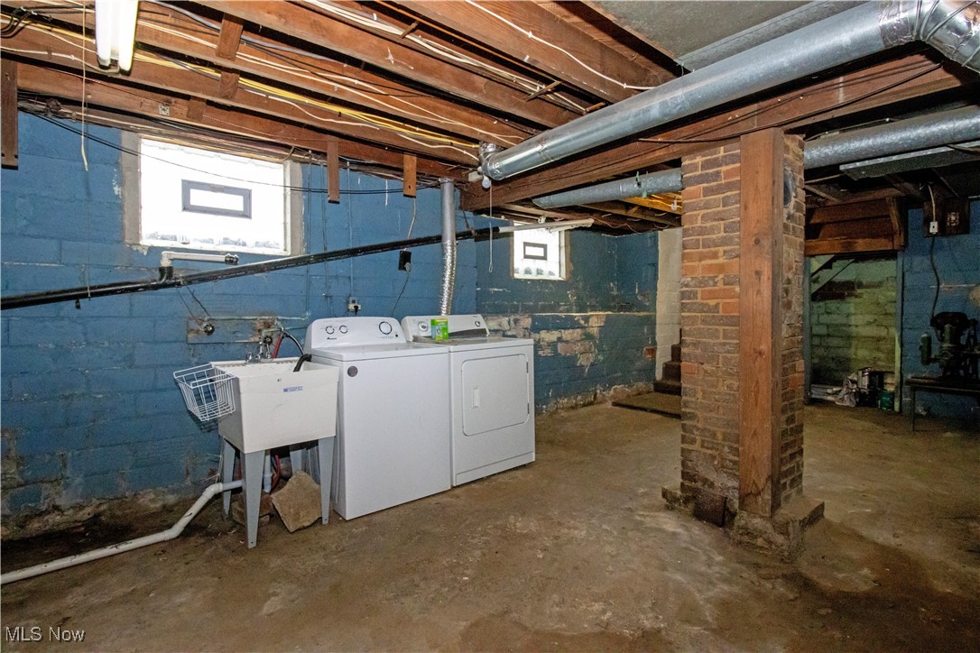 5699 Massillon Road Dalton, OH 44618 - Photo 24 of 24 Basement with washer and dryer and sink