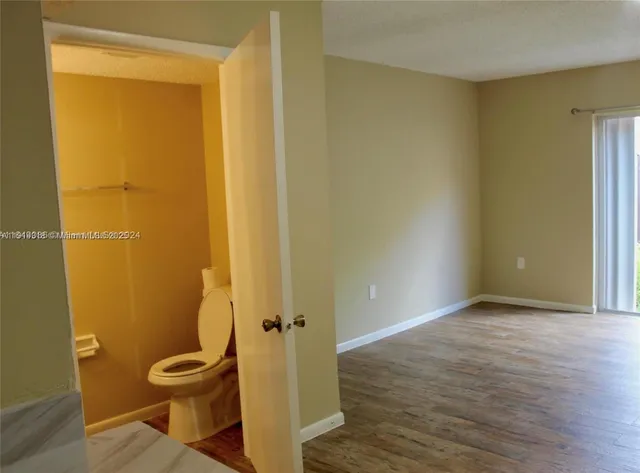 a bathroom with a toilet