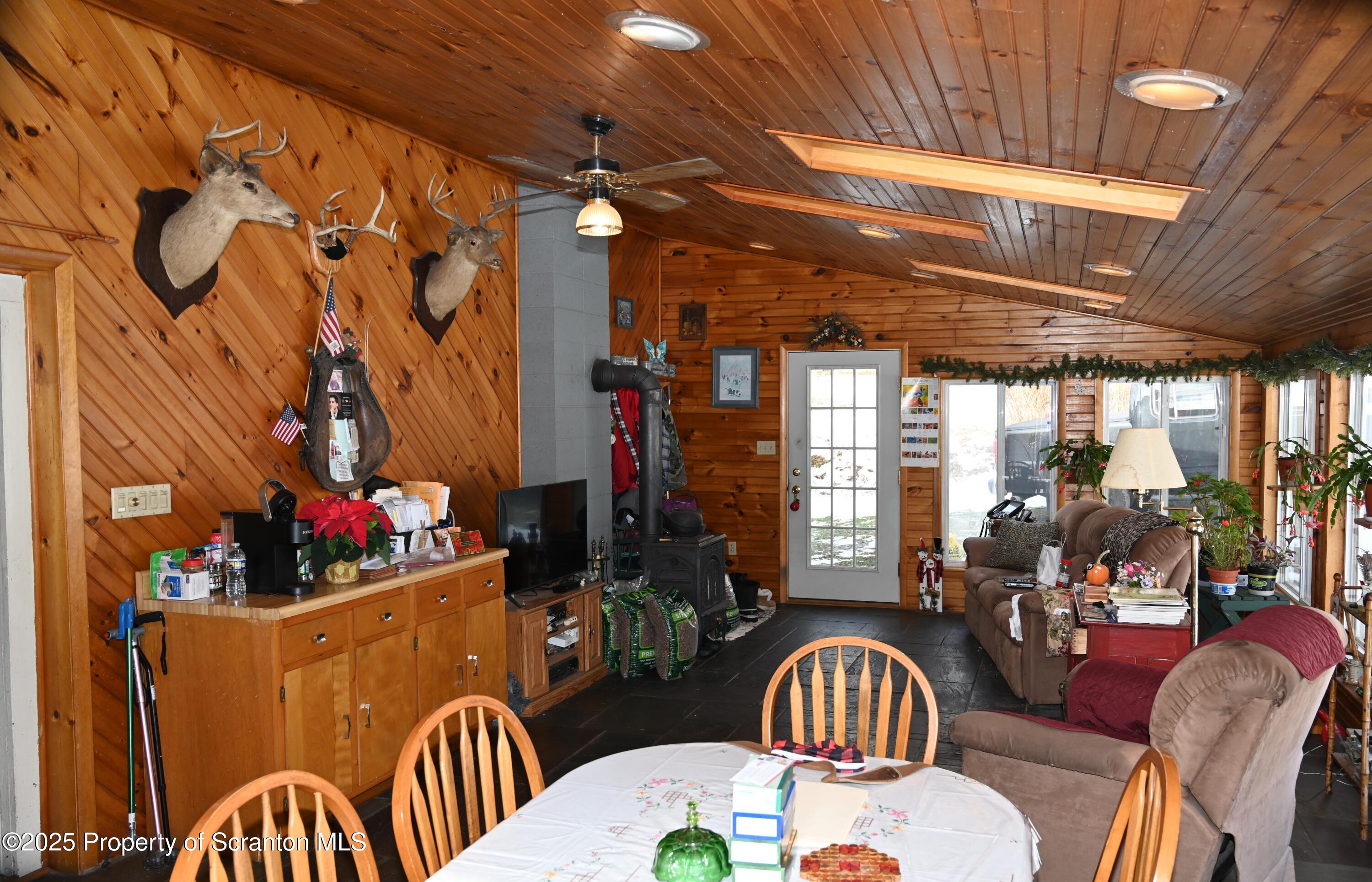 358 Barney Hollow Road Nicholson, PA 18446 - Photo 22 of 61 a dining room with furniture and window