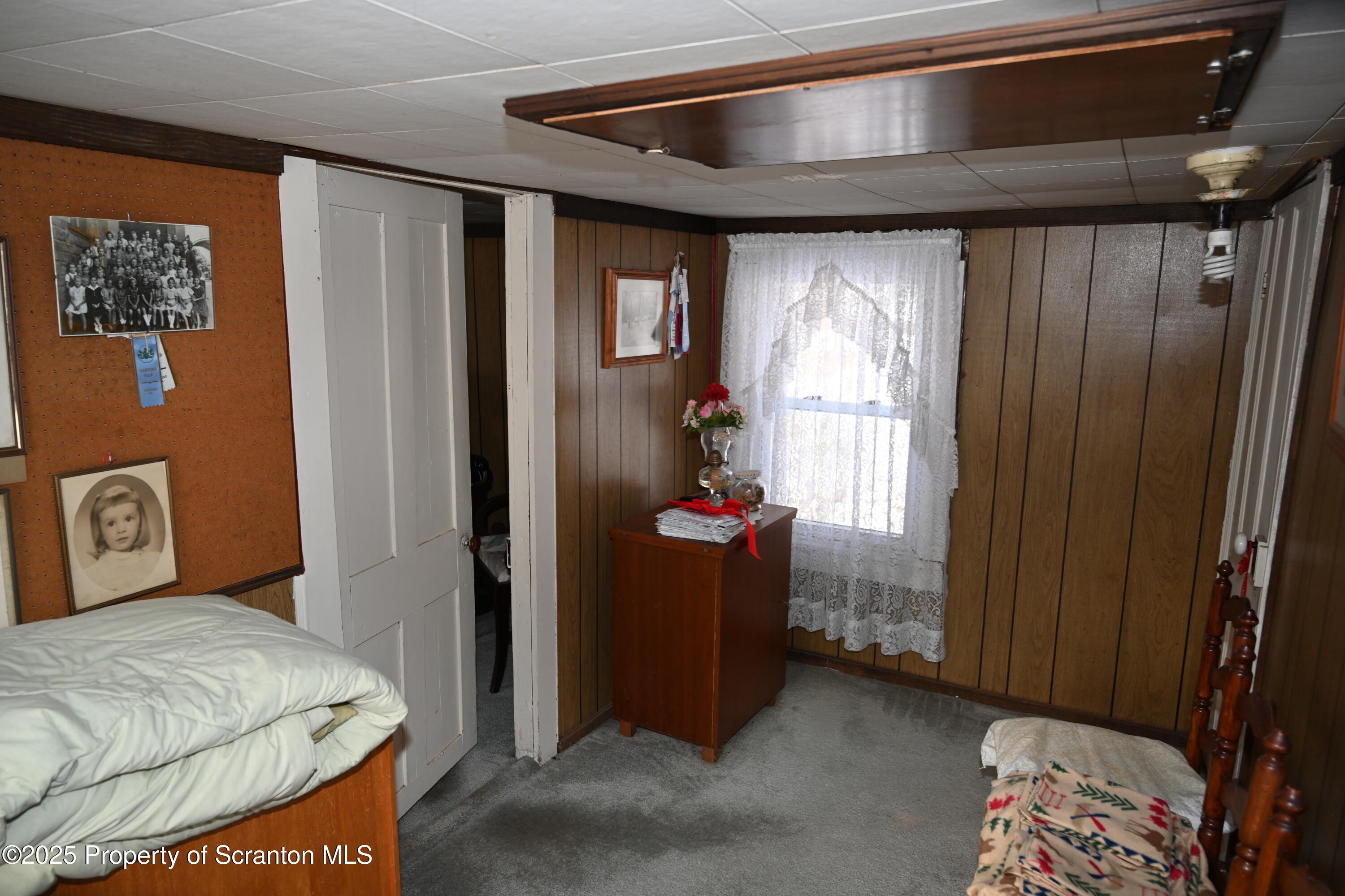 358 Barney Hollow Road Nicholson, PA 18446 - Photo 29 of 61 a bed room with a bed and a window