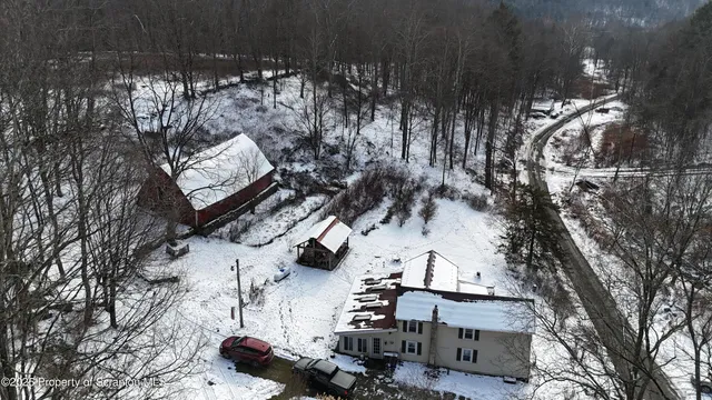a kitchen with stainless steel appliances granite countertop a stove and a microwave