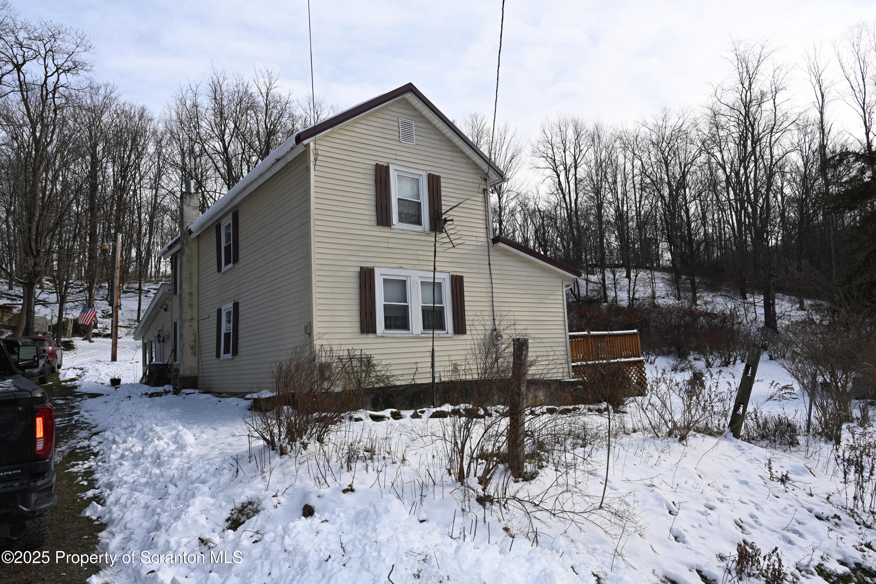 358 Barney Hollow Road Nicholson, PA 18446 - Photo 34 of 61 a view of a house with yard and sitting area