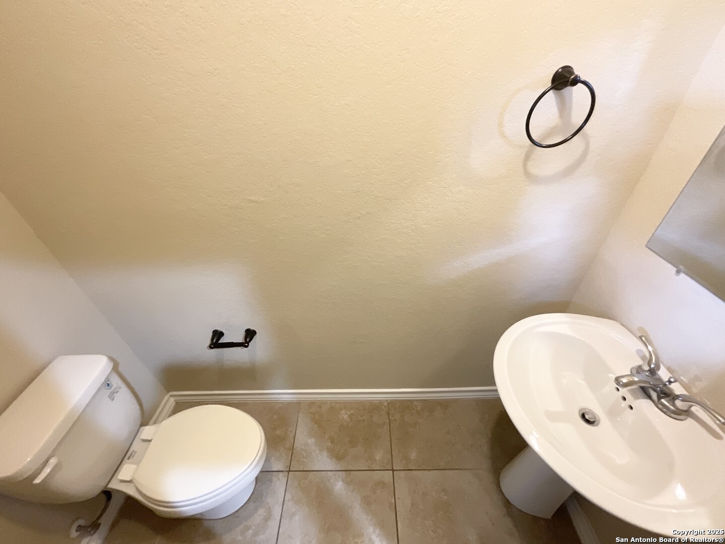 16820 Dancing Ava, Unit 2 Selma, TX 78154 - Photo 11 of 28 a bathroom with a toilet mirror and sink