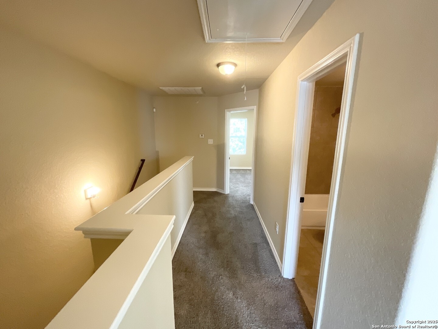 16820 Dancing Ava, Unit 2 Selma, TX 78154 - Photo 15 of 28 a view of a hallway with staircase