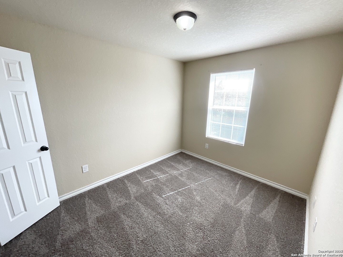 16820 Dancing Ava, Unit 2 Selma, TX 78154 - Photo 23 of 28 an empty room with windows