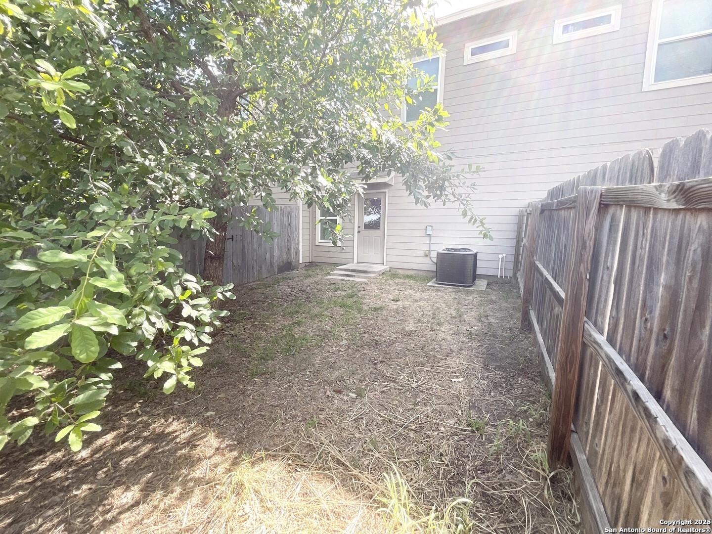 16820 Dancing Ava, Unit 2 Selma, TX 78154 - Photo 27 of 28 a view of a house with a tree