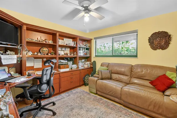 a view of a workspace with furniture