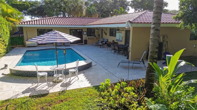 a view of a park with large trees