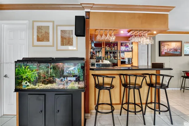 a view of a chairs and table in a patio