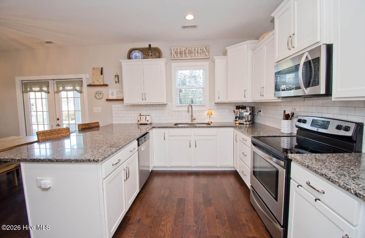 120 Christina Maria Way Cedar Point, NC 28584 - Photo 17 of 43 Granite and tile backsplash is a must
