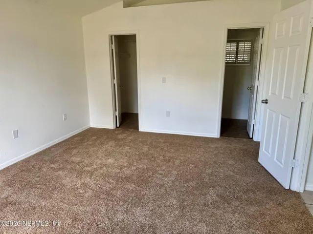 an empty room with closet