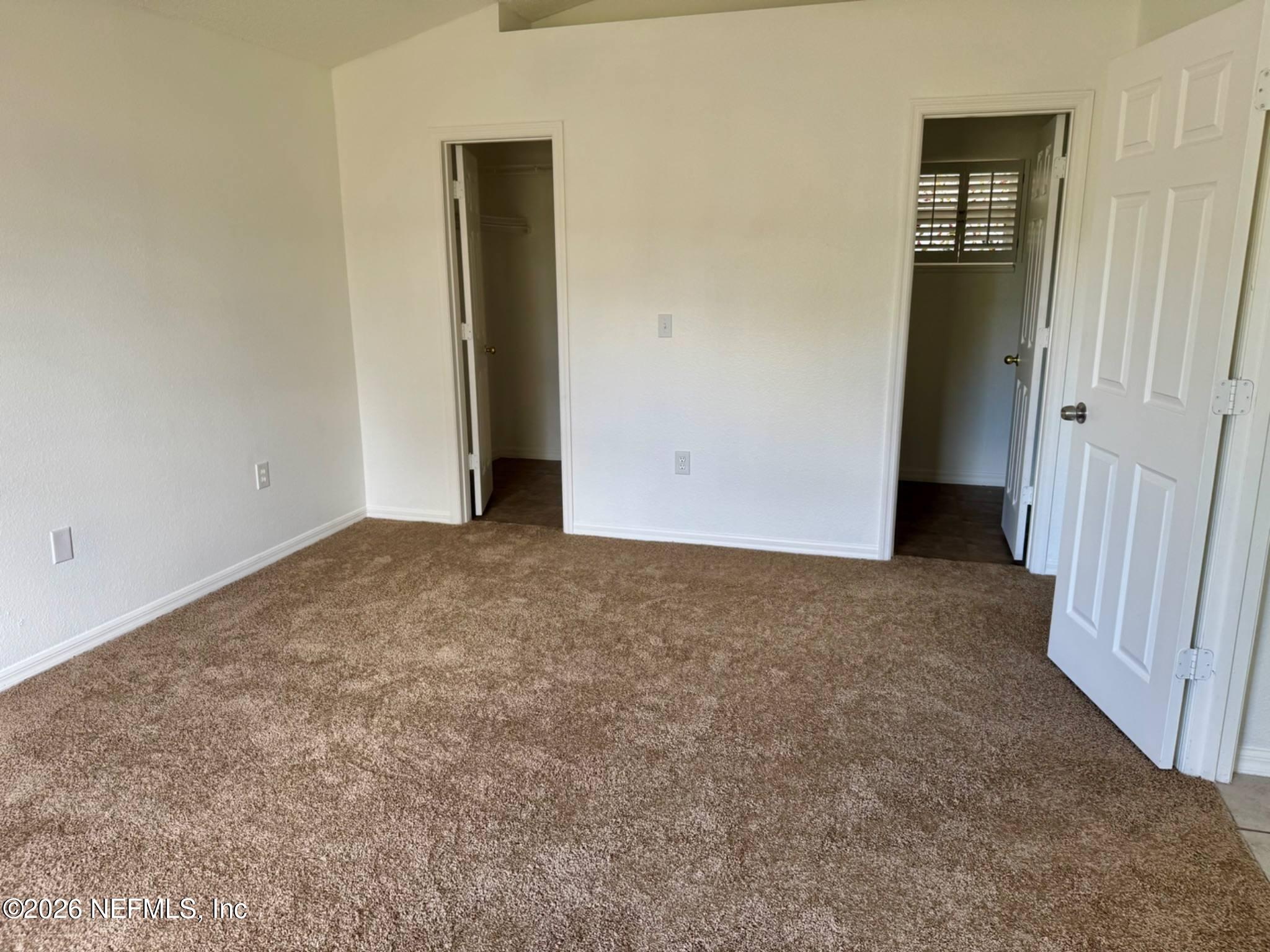 11447 Exmore Street Spring Hill, FL 34609 - Photo 13 of 31 an empty room with closet