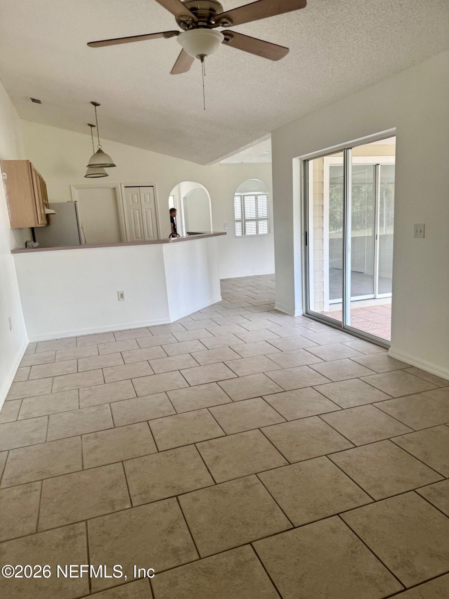 11447 Exmore Street Spring Hill, FL 34609 - Photo 22 of 31 a view of a livingroom with bathroom and a window