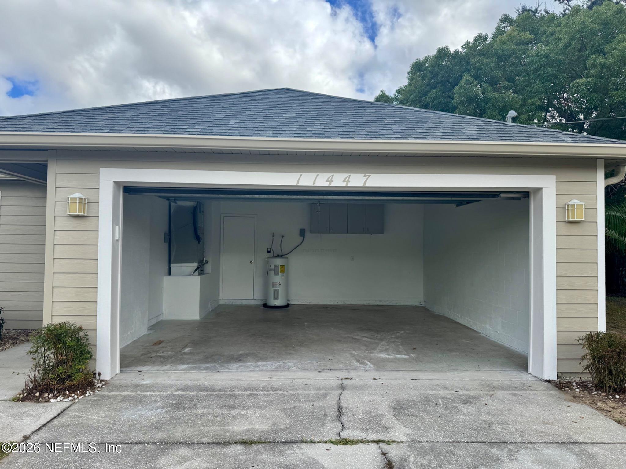 11447 Exmore Street Spring Hill, FL 34609 - Photo 8 of 31 a closeup of a cabinet