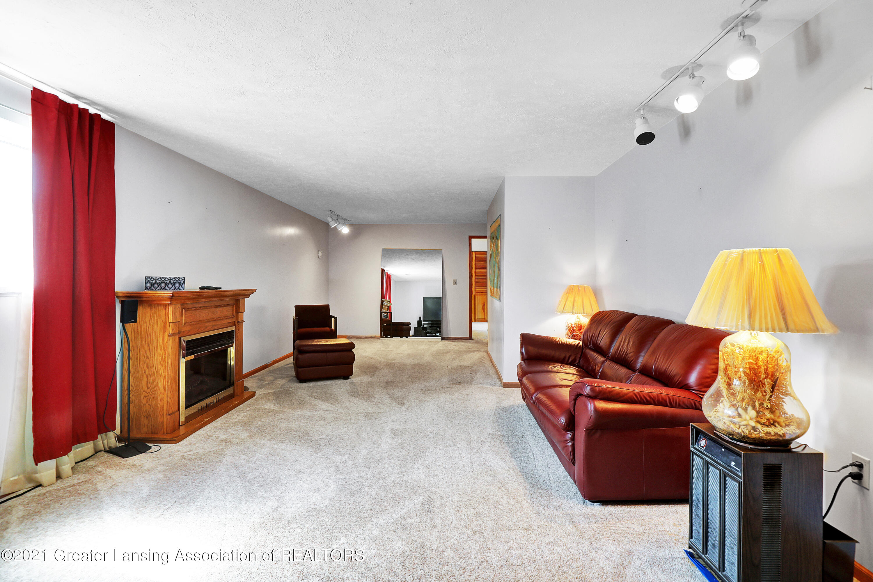 5475 Harper Road Holt, MI 48842 - Photo 21 of 33 family room