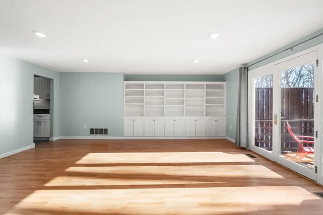 an empty room with windows