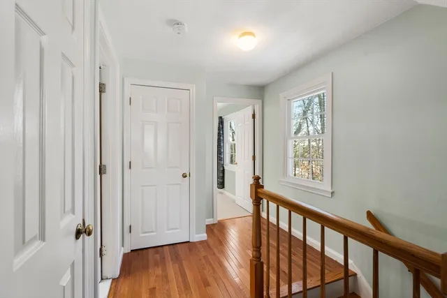 a view of an empty room with a fireplace