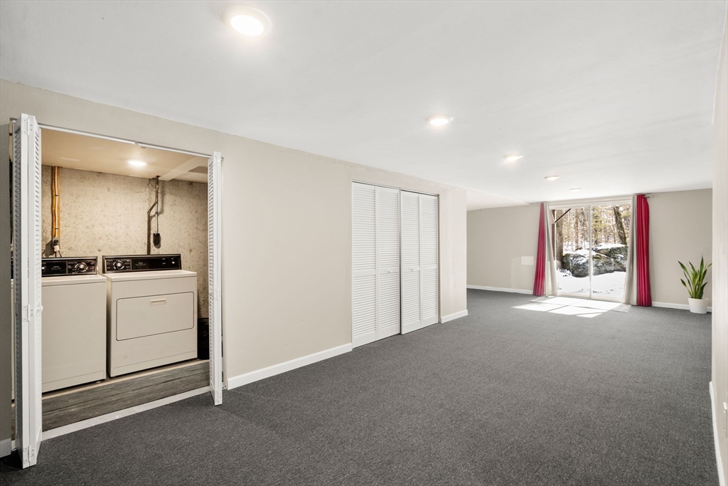9 Oak Ridge Drive, Unit 6 Maynard, MA 01754 - Photo 30 of 39 a view of a room with window and cabinet