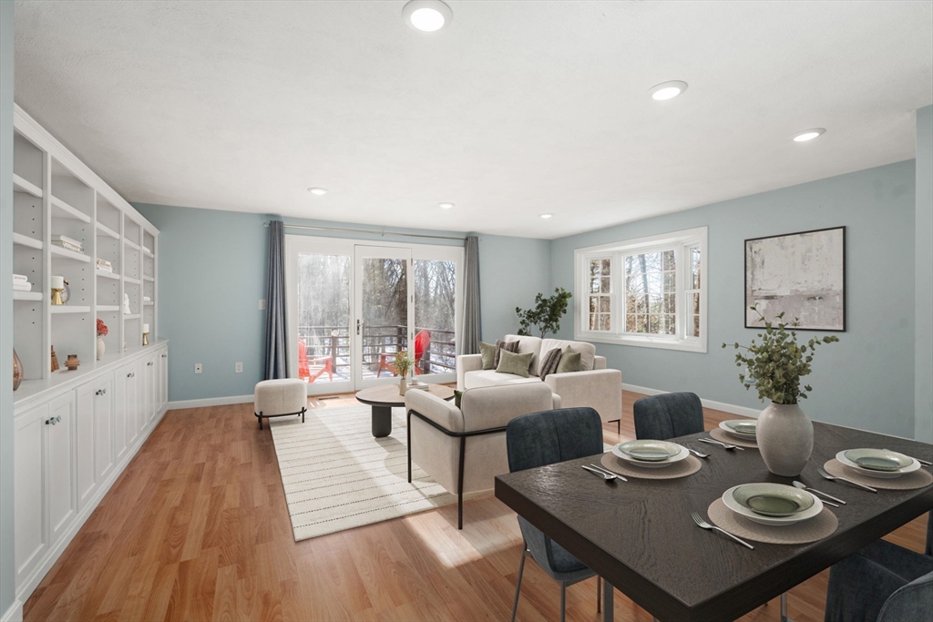 9 Oak Ridge Drive, Unit 6 Maynard, MA 01754 - Photo 3 of 39 a living room with furniture and wooden floor