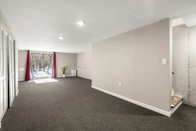 a view of a livingroom with a staircase