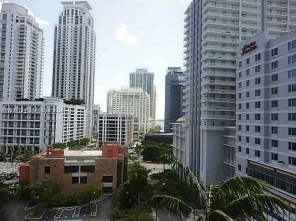 a view of a city with tall buildings