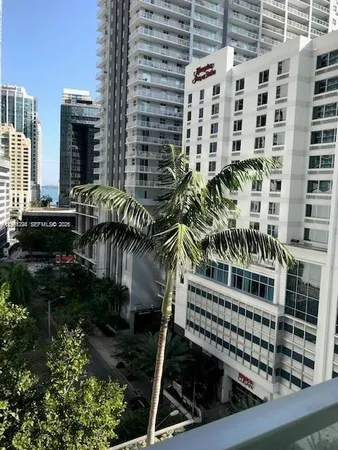 a view of a balcony with plants