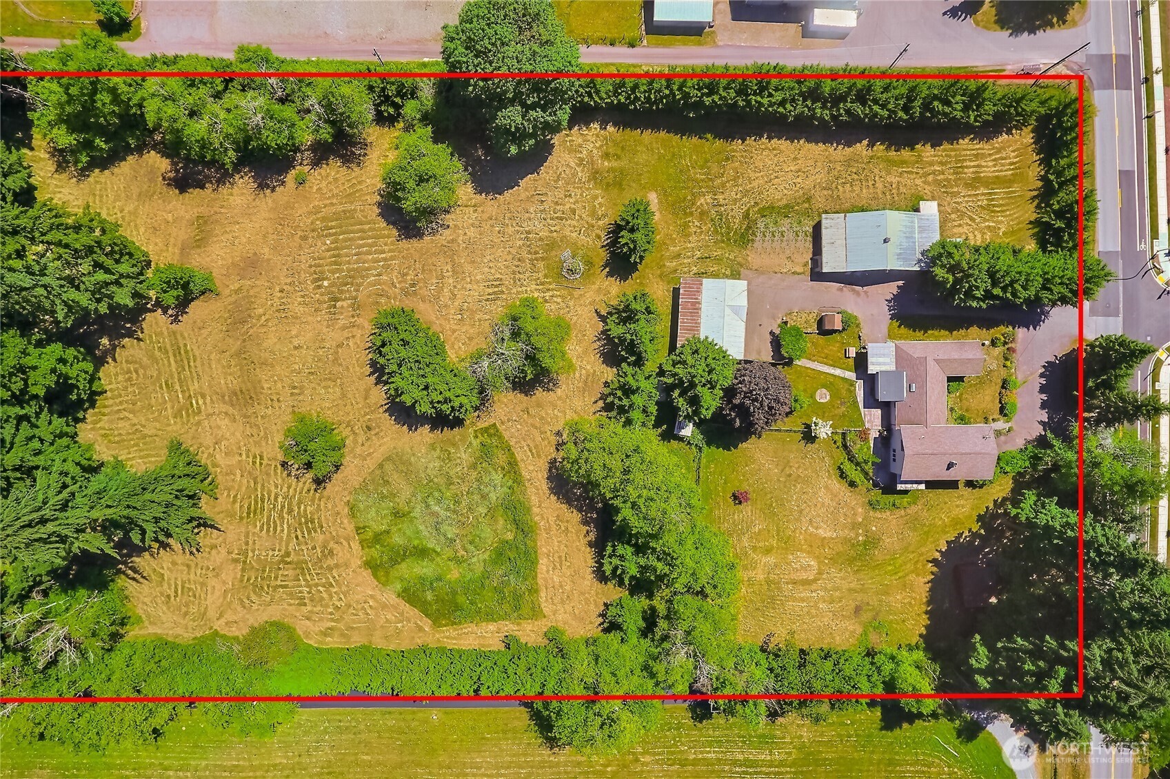 13610 Southeast 288th Street Kent, WA 98042 - Photo 27 of 32 an aerial view of residential houses with outdoor space and swimming pool