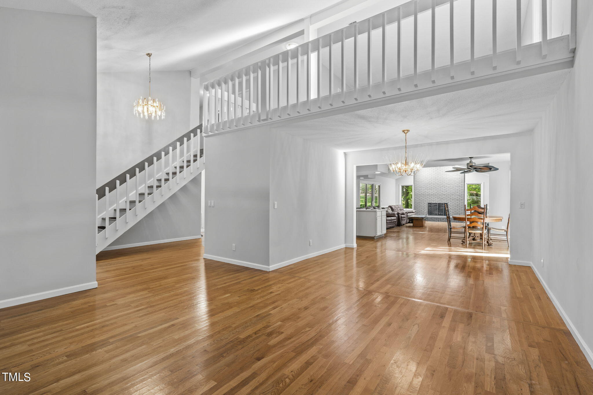 404 King George Loop Cary, NC 27511 - Photo 13 of 60 a view of livingroom with wooden floor