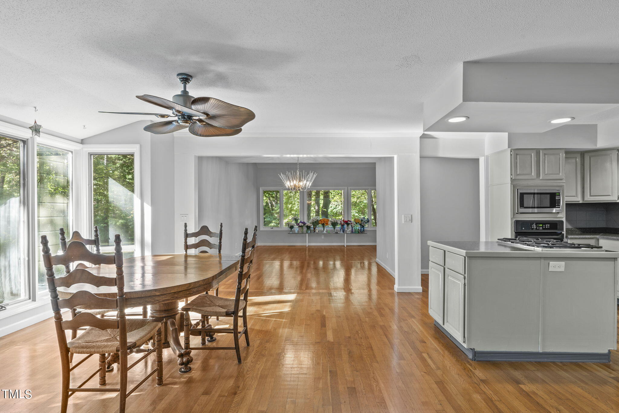 404 King George Loop Cary, NC 27511 - Photo 21 of 60 a view of a dining room with furniture window and wooden floor