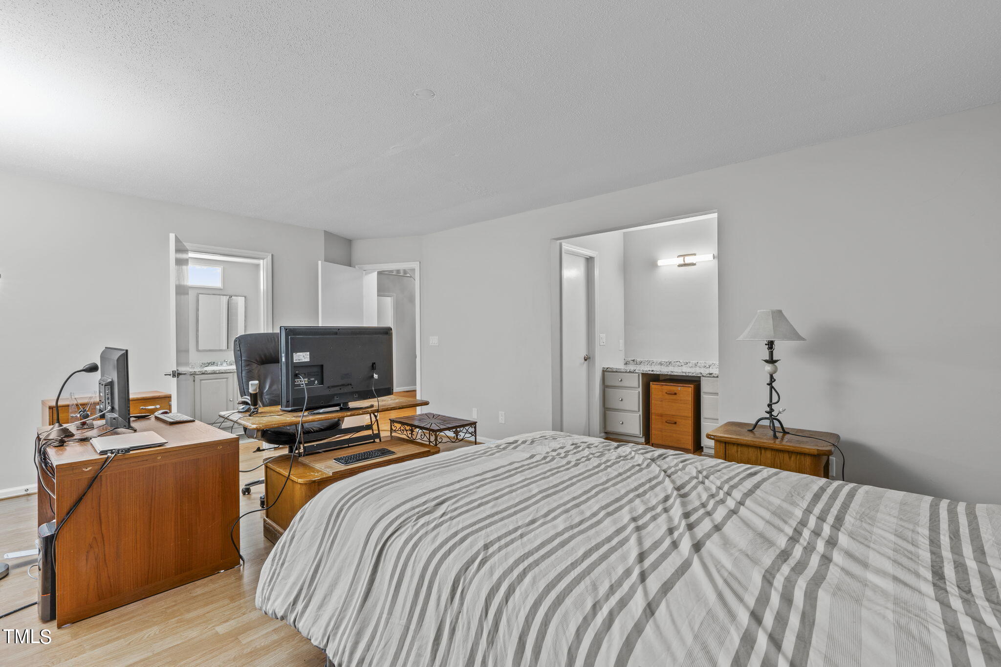 404 King George Loop Cary, NC 27511 - Photo 33 of 60 a bedroom with a bed and a desk