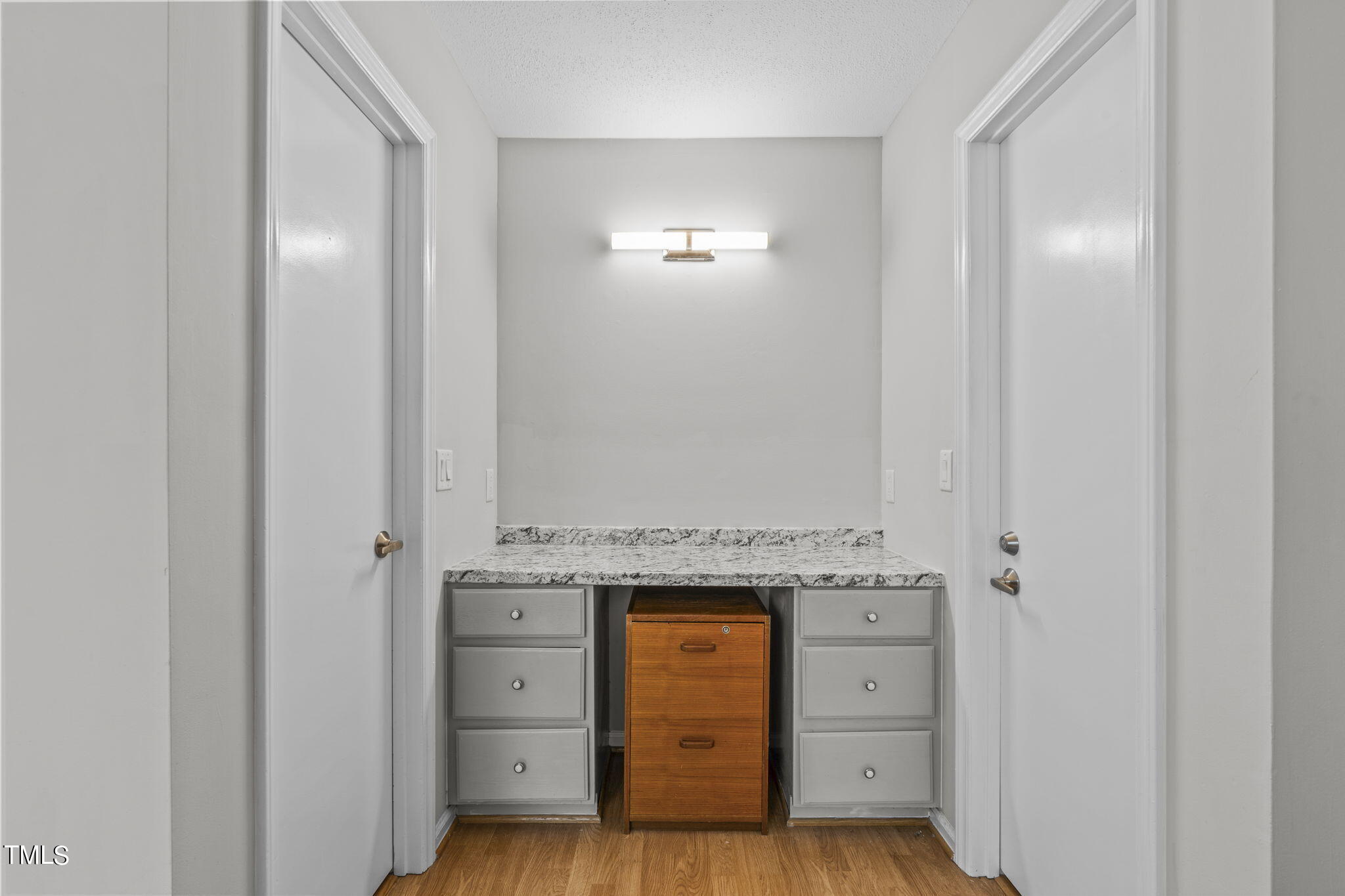 404 King George Loop Cary, NC 27511 - Photo 34 of 60 a view of cabinets and wooden floor