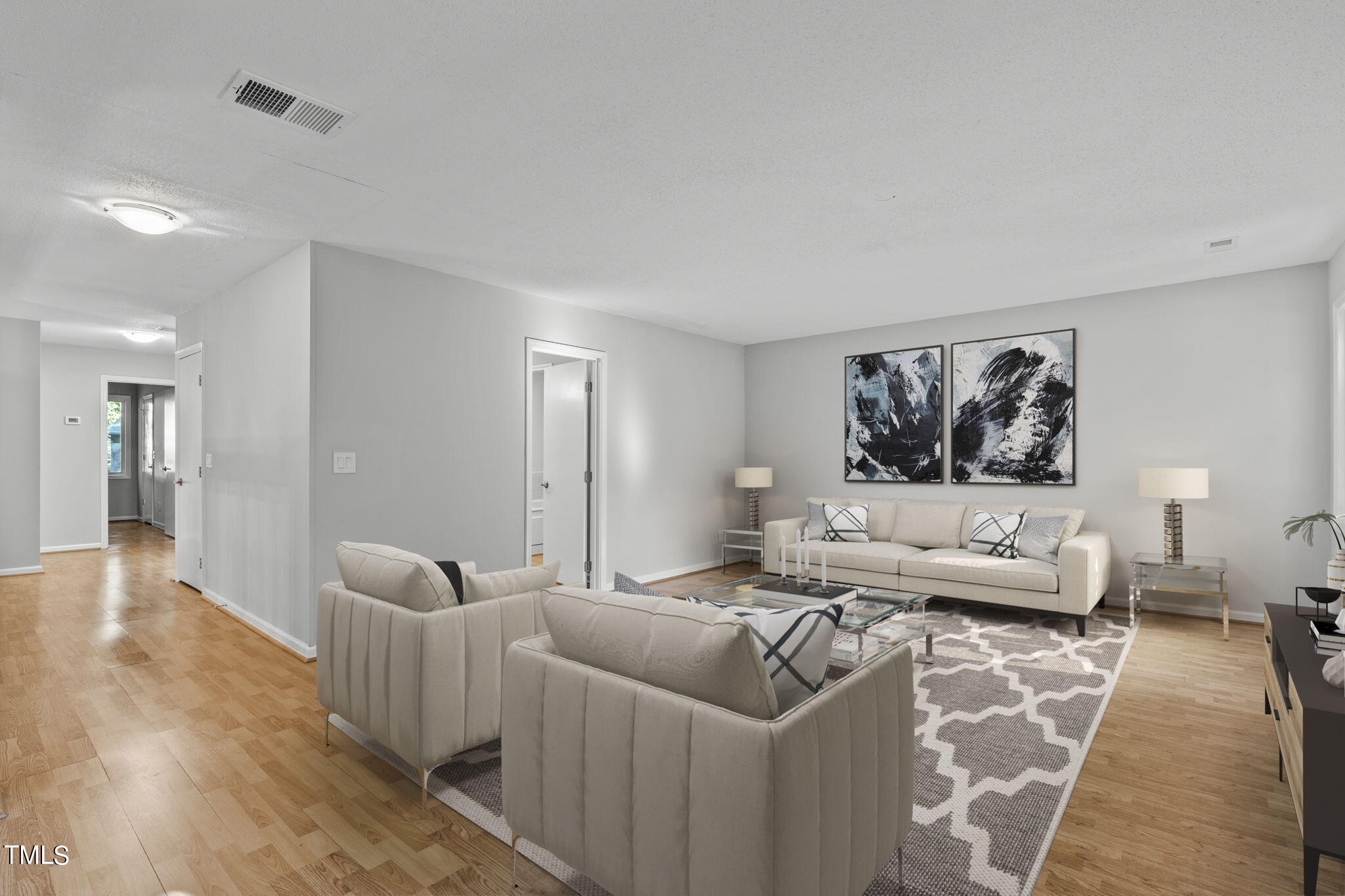 404 King George Loop Cary, NC 27511 - Photo 39 of 60 a living room with furniture and a couch
