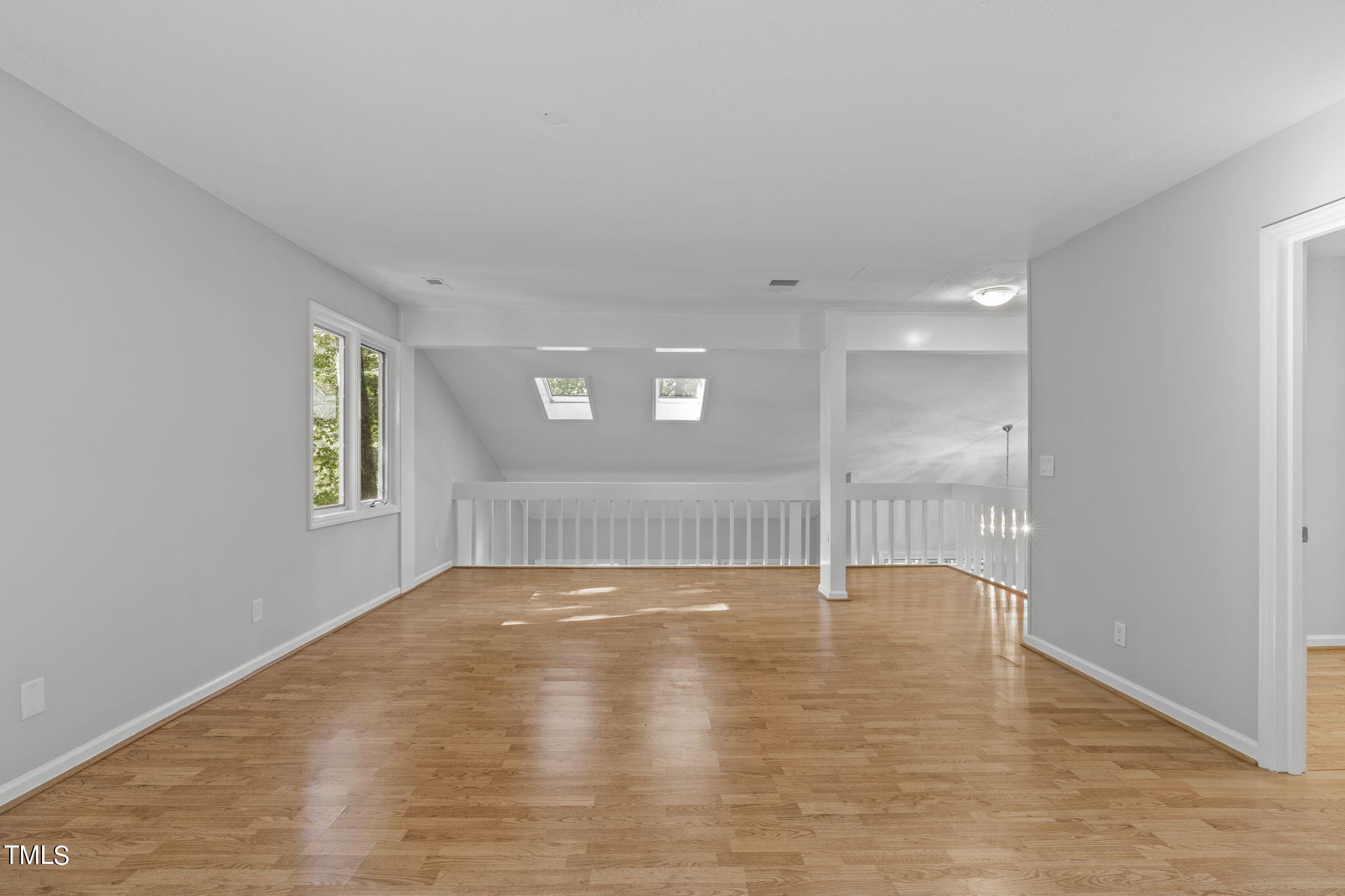 404 King George Loop Cary, NC 27511 - Photo 43 of 60 a view of an empty room with glass door