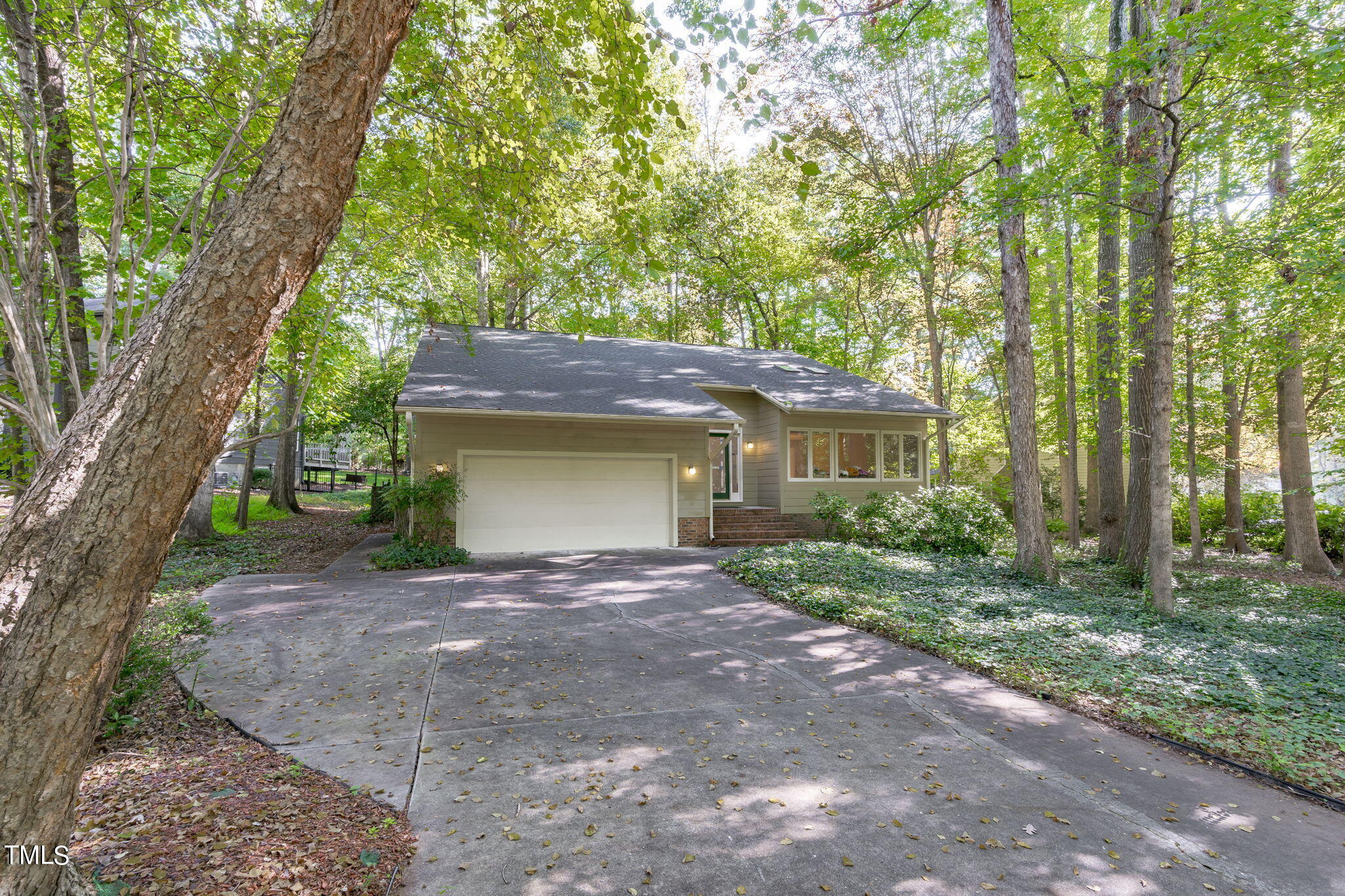 404 King George Loop Cary, NC 27511 - Photo 5 of 60 a view of a house with a tree and front view