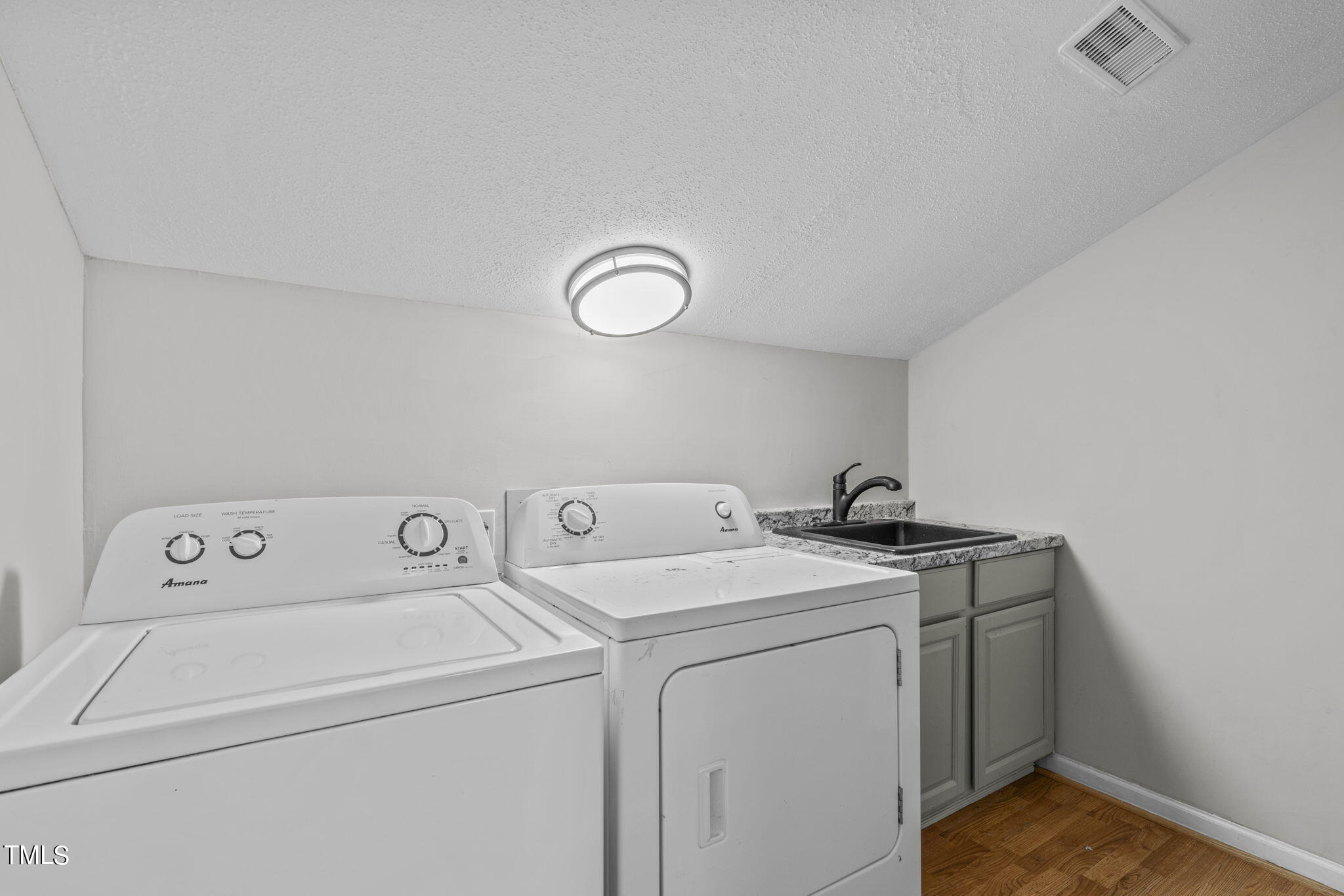 404 King George Loop Cary, NC 27511 - Photo 53 of 60 a utility room with dryer and washer