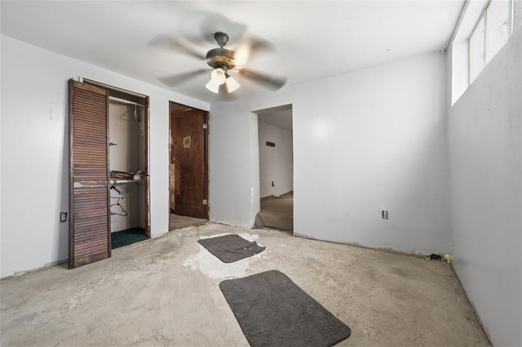 96 Meanor Street Imperial, PA 15126 - Photo 15 of 44 an empty room with closet and a chandelier fan