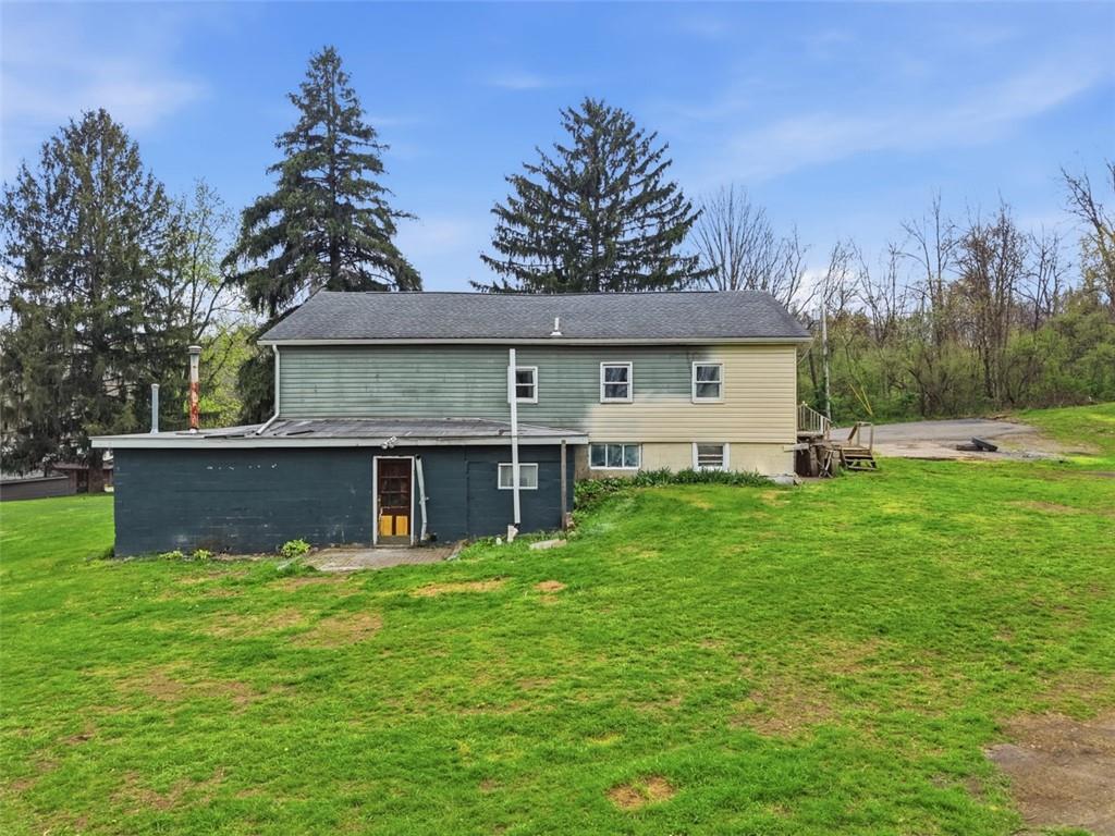 96 Meanor Street Imperial, PA 15126 - Photo 41 of 44 a front view of a house with garden